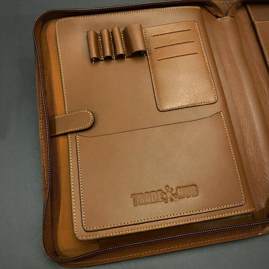 Trade Hub leather work folder open, top-down view of pen loops, card slots and document pocket